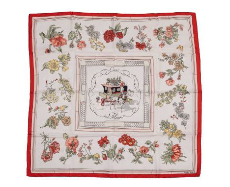 A ‘Quai aux Fleurs’ silk scarf by Hermès Paris, on a white background with a red rim, depicting a horse and carriage as a cen