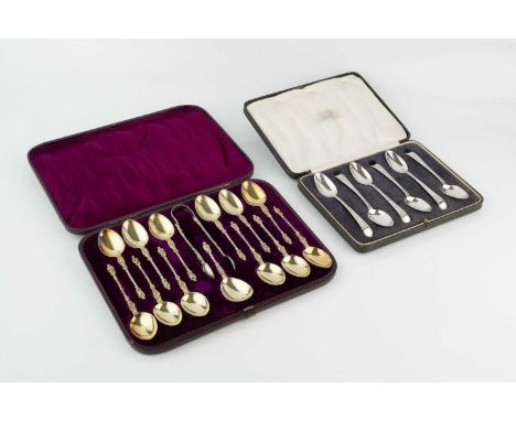 A set of twelve mid-Victorian silver gilt apostle top teaspoons, with matching sugar tongs and caddy spoon by Henry Holland, 