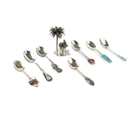 A collection of six silver and enamel Bermuda souvenir spoons, each having enamel floral, island or flag decoration, all stam
