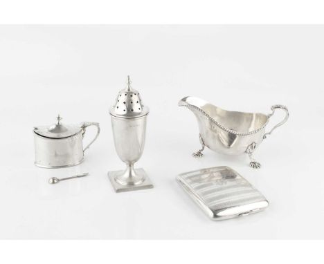 A silver sauce boat, with gadrooned border, leaf capped handle and scalloped feet by Adie Bros, Birmingham 1941, 15.5cm long,