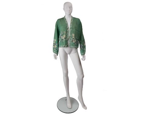 A 1920’s/1930’s Japanese style, loose jacket with long flared sleeves
100 % fine quality silk
Pale green with yellow, white a