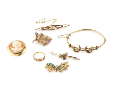 A 9ct gold, turquoise and seed pearl set brooch, of bow form, 3.7cm wide, a 9ct gold and amethyst set leaf brooch, a 9ct gold