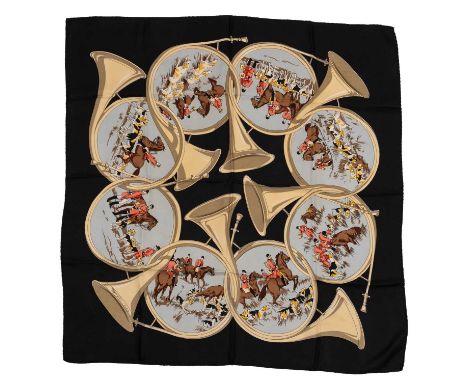A Hermès silk scarf depicting interlocking horns, and hunting scenes with men in their attire, horses and hounds on a black b