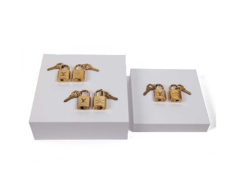 A collection of three pairs of Louis Vuitton padlocks and keys, 'Made in Paris', numbered 303, 326 and 310 (6)
&nbsp;

Good, 
