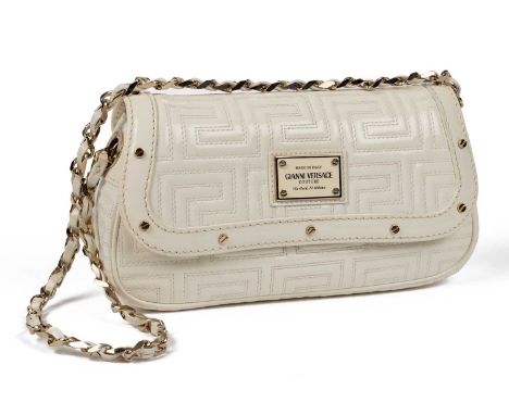 A Gianni Versace cream, patent leather shoulder bag with weaved shoulder chain, length 23cm, height 13cm
(Bought from Bloomin