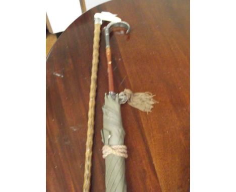 Vintage walking stick and vintage umbrella