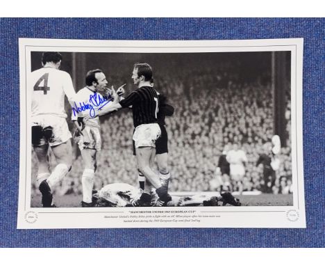 Football. Nobby Stiles Signed 18x12 black and white photo. Photo shows Stiles picking a fight with an AC Milan Player in 1969