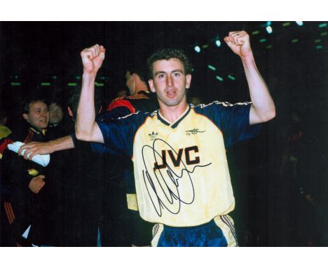 Nigel Winterburn signed 12x8 colour photo pictured during his playing days with Arsenal F. C. Good condition. All autographs 