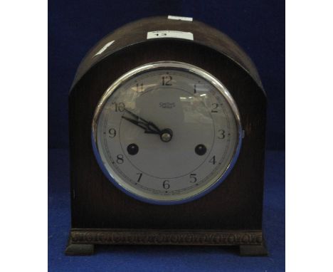 Small Smiths oak arch top two train mantel clock. 