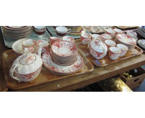 Two trays of 19th Century Staffordshire teaware items on a white ground with gilt and red foliate decoration comprising: Tea 