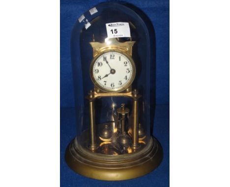 Mid century brass 100 day perpetual motion dome clock.