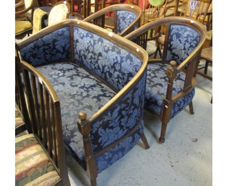 Edwardian mahogany inlaid, foliate upholstered parlour suite comprising two seater sofa and a pair of tub chairs. (3)