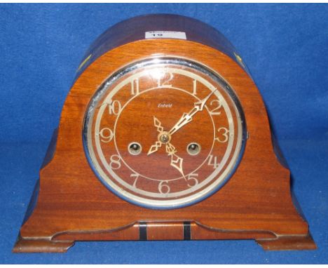 A mid Century Enfield oak arched mantel clock with two train movement.