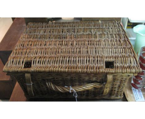 Wicker picnic hamper containing cased bread knife.