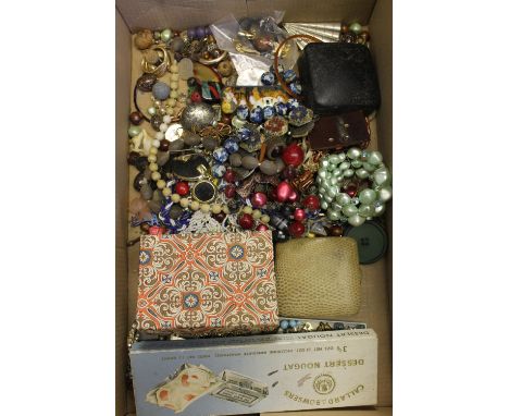 Box of assorted costume and dress jewellery to include: beads; buckles; earrings; bangles; cuff links; Mersmann alarm clock e