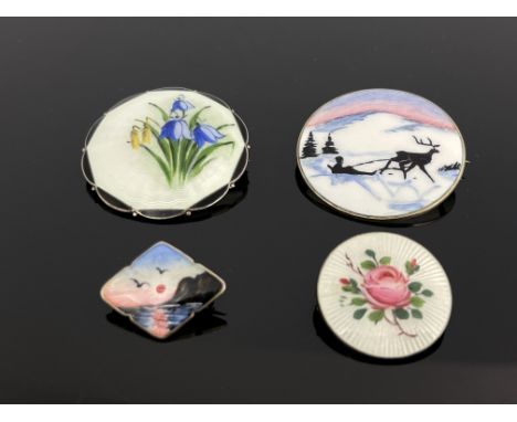 Four Norwegian silver gilt and enamelled brooches, painted guilloche enamel floral and landscape designs, 4cm diameter, 41.5g