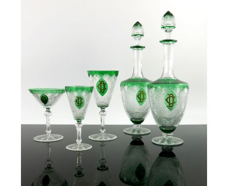 An extensive Baccarat green tinted cut glass wine service, Nonancourt pattern, circa 1950s, each with a gilt engraved monogra