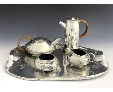 Archibald Knox for Liberty and Co., an Arts and Crafts Tudric pewter five piece tea set, model 0231, the teapot of squat ovoi