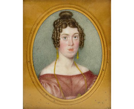 A mid 19th century oval portrait miniature on ivory, circa 1840, a young lady in the Regency style, in a leather hinged prese