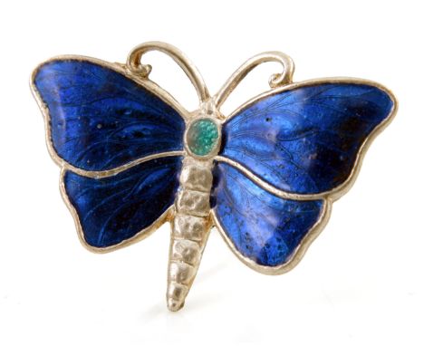 Charles Horner, an Arts and Crafts silver and enamelled brooch, in the form of a butterfly, blue enamel wings and green head,