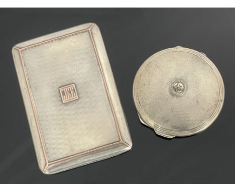 A George V silver and gold overlay cigarette case, Asprey and Co., London 1912, rectangular engine turned with rose gold stri