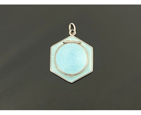 A Norwegian silver gilt and enamelled pendant compact, hexagonal lens form, blue guilloche enamel to both sides, 4.5cm long