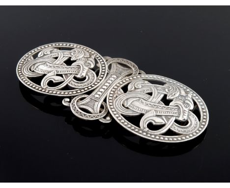 A Norwegian Dragestil silver reticulated buckle, Marius Hammer, Bergen circa 1915, the oval panels of zoomorphic knots within