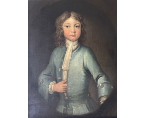 Circle of Charles D'Agar (British, 1669-1723), portrait of a boy, half length in a blue coat, painted oval, oil on canvas, 72