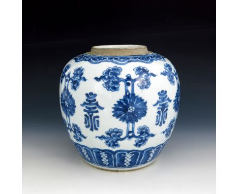 A Chinese blue and white ginger jar, Kangxi period, painted with a frieze of alternating script and floral devices with a lap