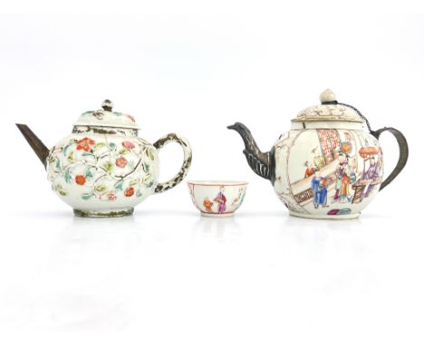 Two Chinese export teapots and a tea bowl, 18th century, ovoid form, one relief moulded with blooming tendrils, the other wit