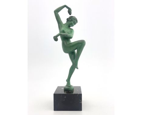 Marcel Bouraine for Max Le Verrier, Dancer with Grapes, an Art Deco patinated art metal figure, circa 1925, modelled as a nud