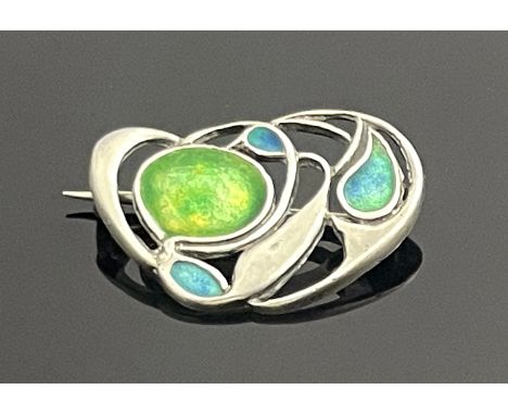 Archibald Knox for Liberty and Co., an Arts and Crafts Cymric silver and enamelled brooch, circa 1900, reticulated knotted bu