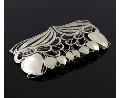 Archibald Knox for Liberty and Co., an Arts and Crafts Cymric silver buckle, Birmingham 1901, each panel of pierced tendril a