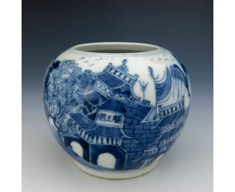 A Chinese blue and white brush pot, of ovoid form, painted with pagoda landscapes, blue four character Kangxi mark, 8cm high 