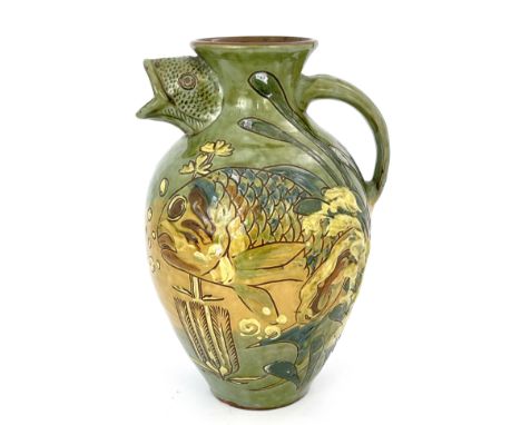 James Dewdney for C H Brannam, an art pottery fish moulded vase, circa 1900, ovoid form, sgraffito and slip decorated with aq