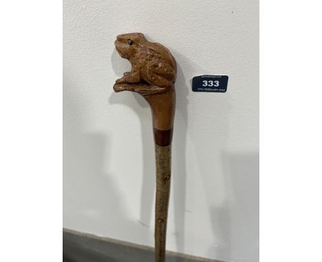 A hazel walking stick, the pommel hand carved as a frog. 49½' long