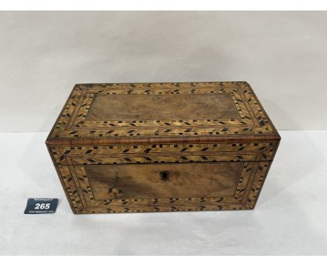 A Victorian walnut tea caddy with banded inlay in various woods. 9' diam.