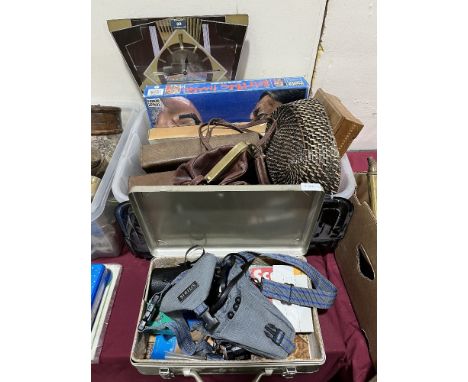 A box of vintage handbags, clock and sundries with a metal case of photographic equipment