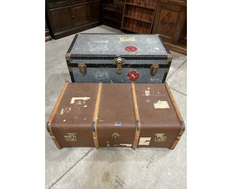 A tin trunk and a canvas case