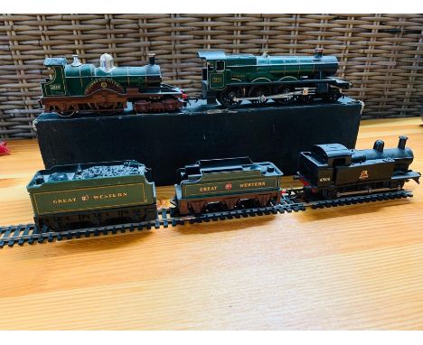 A Hornby engine, 4916 and two coal trucks along with " Lord of the Isles" 3046 Triang Engine 