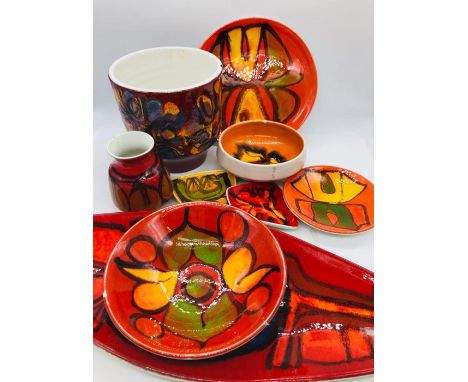 Nine items of Poole Pottery