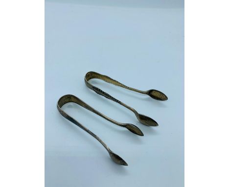 Two silver sugar nips, one by Sutherland &amp; Roden Sheffield 1906.