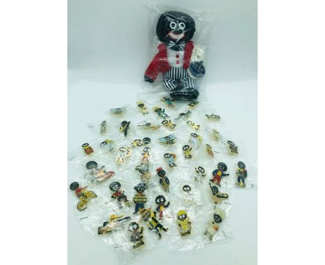 A Large selection of enamel Robertson badges and doll in original packaging unopened with DSN labels 1980's 