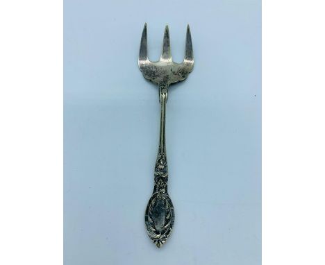 A hallmarked silver toasting fork