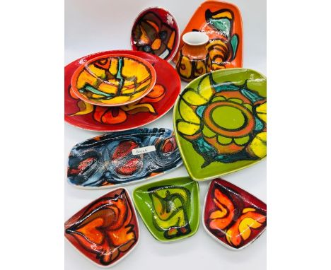 A selection of ten pieces of Poole pottery, various styles and shapes.