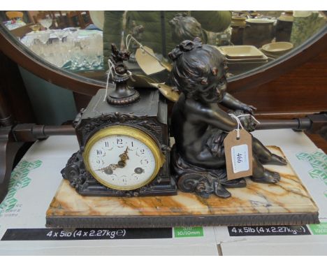 European mantleclock on rectangular brown marble plinth, the bronze cased clock with decorative circular brass and white pain