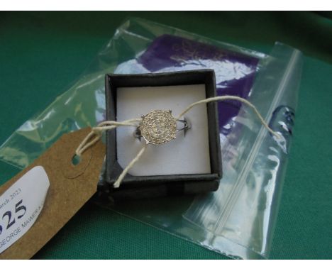 Circular 40 stone diamond cluster ring, .50ct. sold with certificate of authenticity 