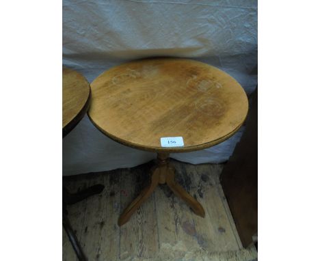 Circular topped light oak drinks table on tricorn base