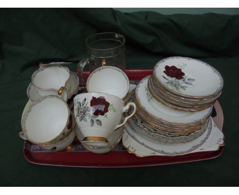 21 piece Royal Staffordshire bone china 'Roses to Remember' tea service, glass water jug etc.