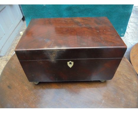 Figured mahogany 2 cpt. tea caddy and contents to include 4 cigars